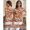 imageBlingfit Cold Shoulder Tops Tunic Summer Slim Fit Shirts for Women V Neck Short Sleeve Casual Tees Workout TopsRed Background Print